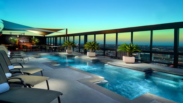 ausctr-omni-austin-hotel-downtown-evening-pool-590x333.jpg