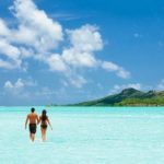 destination-tahiti-hero-couple-overwater-bungalow-bora-bora-2000x837-590x247.jpg
