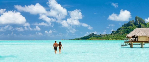 destination-tahiti-hero-couple-overwater-bungalow-bora-bora-2000x837-590x247.jpg