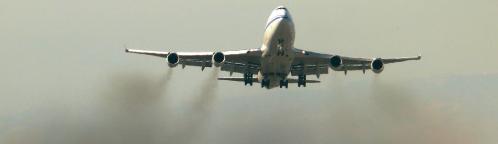traveling the world and Airplane Emissions